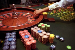 Kaip azartiniai lošimai didina korupcijos riziką